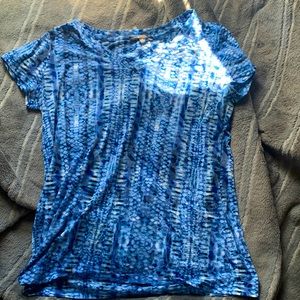 This is a blue and white shirt for a woman. Great for the summer!